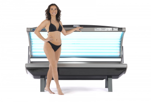 Solar Wave 24 Lamp Tanning Bed with 24 lamps and a model
