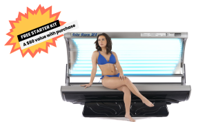 Solar Storm 32r Tanning Bed with 32 lamps opened with model sitting